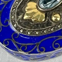 Early 20thC Oval Silver and Gold Enameled Pill Box with Tanzanite Gem