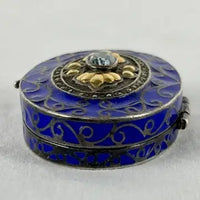 Early 20thC Oval Silver and Gold Enameled Pill Box with Tanzanite Gem