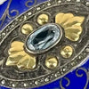 Early 20thC Oval Silver and Gold Enameled Pill Box with Tanzanite Gem